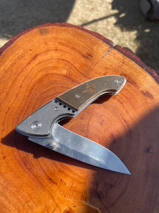 Folding knife with brown ref micarta